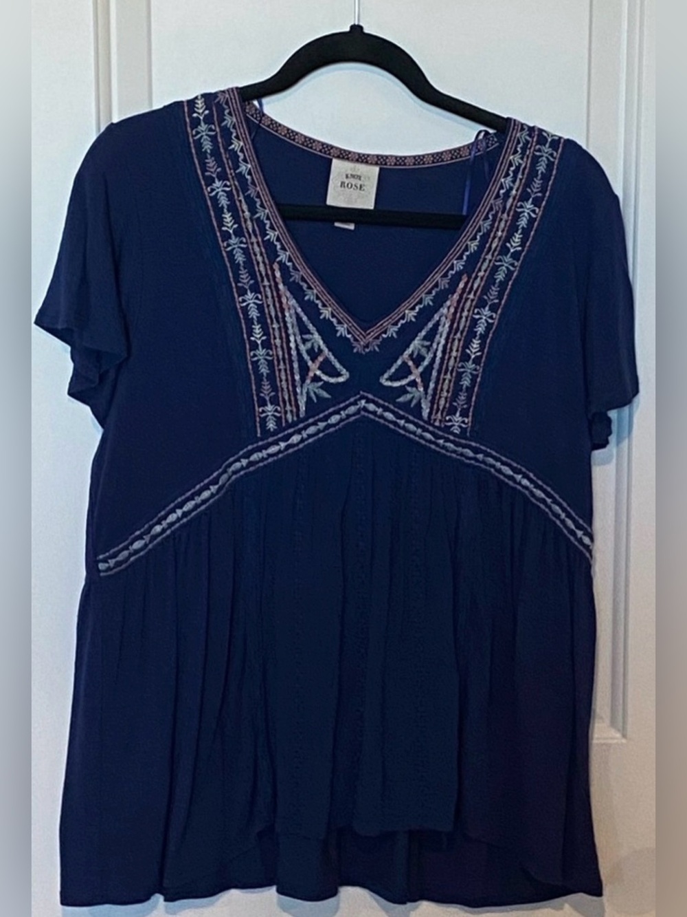 Knox Rose Blue embroidered empire waisted top.